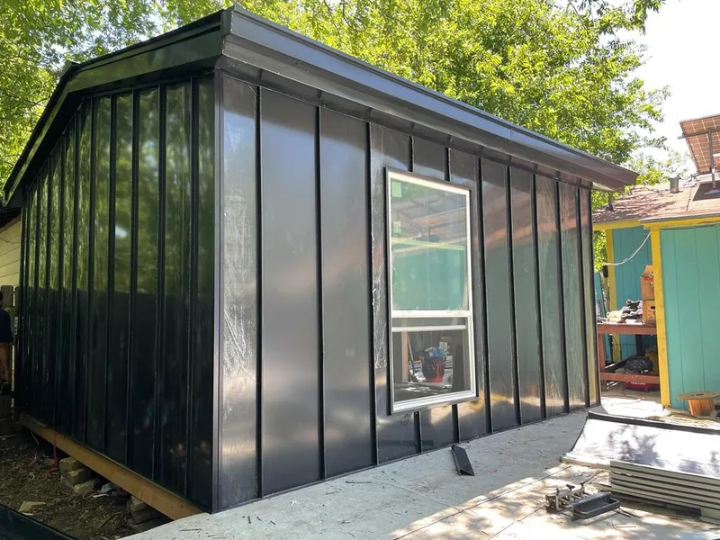 Black standing seam metal wall panels for Roof Inspection in Dover